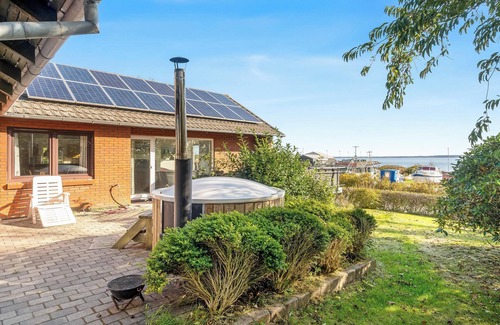 Thyholm House | Large holiday home with a view of the fjord.