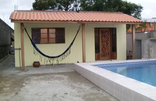 Peruibe House | Large house with pool and barbecue, 4 parking spaces, total security.
