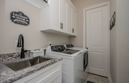 Evans House | Large, Luxury, Family-Sized Home with Game Room, Screened Porch & Exercise Area