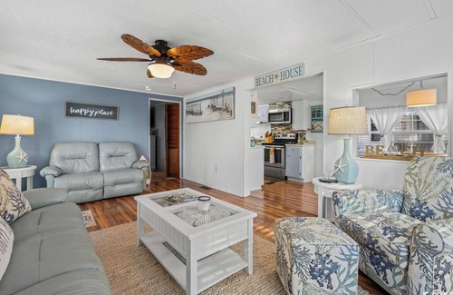 Surfside Beach Resort | Large outdoor area straight shot to the beach. Stocked coffee bar with expresso!