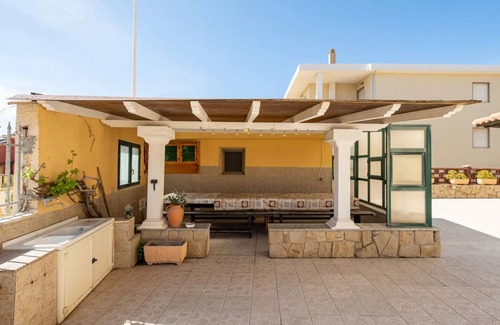 Lu Bagnu Apartment | Large seaside apartment with patio in Lu Bagnu