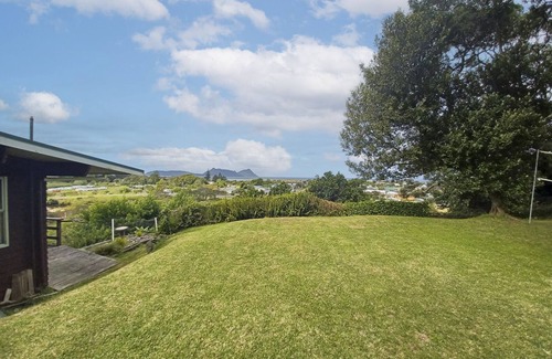 Ruakaka House | Large sunny home with stunning panoramic sea views of Bream Bay