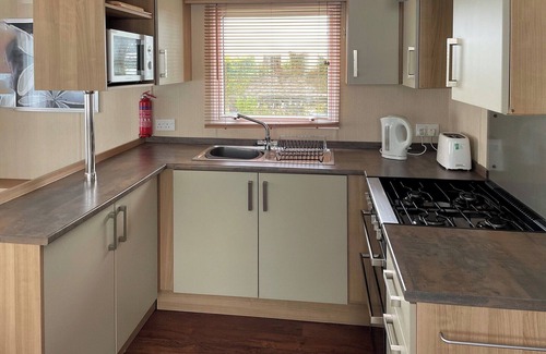 Mynachlogddu House | Large, supreme 12ft-wide caravan with one double with en suite W.