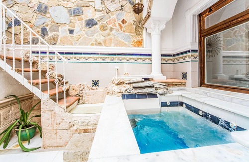 La Font d'en Carros House | Large Valencia townhouse near the sea, with private bar area, courtyard with outdoor Jacuzzi, roof t