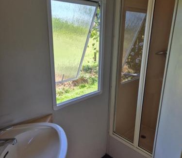 Auxy House | Le mobile home est dans le pré