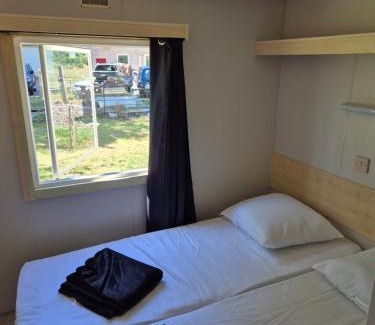 Auxy House | Le mobile home est dans le pré