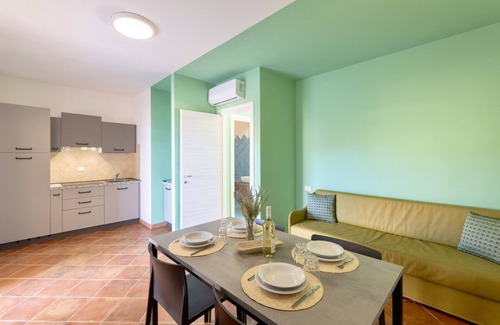 Paduledda Apartment | Le Rocce Rosse Two-room apartment 6 beds sea view