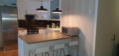 Alna Apartment | Leilighet(75m²)+hage(40m²) 20 min fra sentrum
