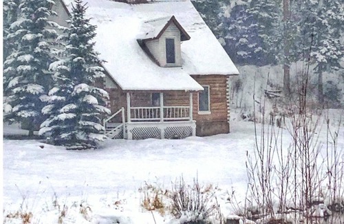 Highland Meadows Cabin | Lena's Cabin in Vail is nestled right beside Gore Creek, minutes from skiing.