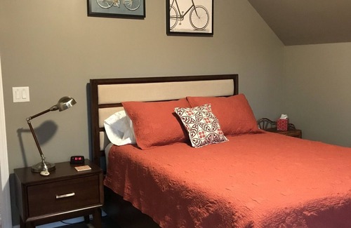 Travelers Rest House | Light and airy contemporary guest house with private deck and parking.