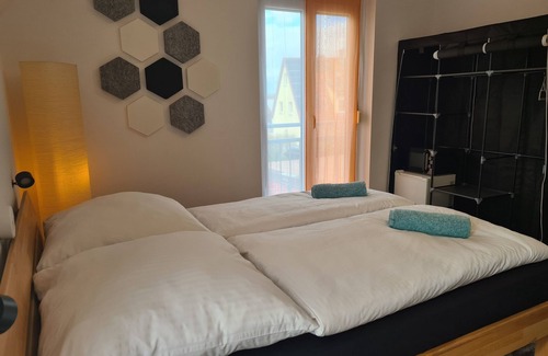 Waldbuttelbrunn Bed & Breakfast | Light-flooded guest room - Mainwiesen