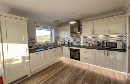 Pollachar Cottage | LINGEIGH, pet friendly in Daliburgh, Isle Of South Uist