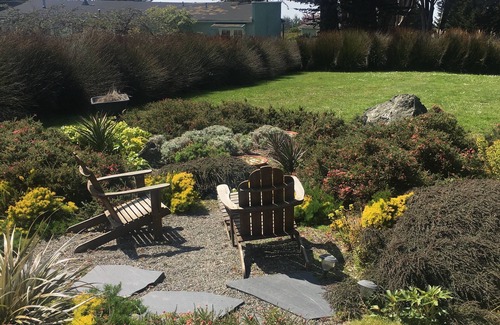Little River Cottage | Little River Gem: ocean views, exquisite gardens, 1 floor, private, 850 sq ft,