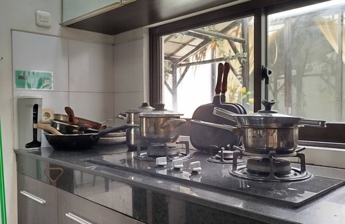 Surabaya House | Lively 3-bedroom house 180m2 with WiFi, AC in georgeous Surabaya