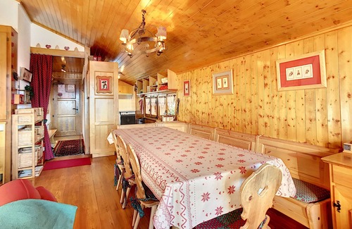 Verbier Apartment | Living room with fire place, kitchen with vitroceram, dishwasher, microwave and washingmachine, eati