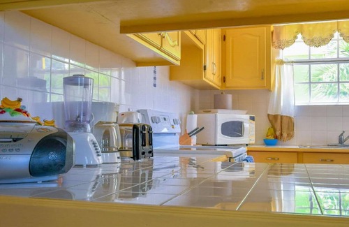 Prospect Apartment | Located on a ridge above the Barbados West Coast, 10 min walk to the Beach, in a quiet neighbourhood
