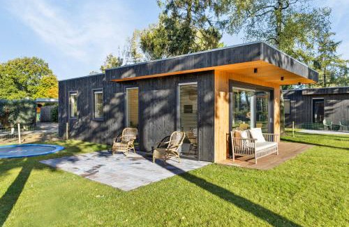 Krachtighuizen Ski Chalet | 'Lodge de Vos' luxe en vrijstaande lodge bij het Speulder- en Spielderbos