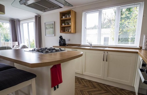 Corton Cabin | Lodge with decking and sea views at Azure Seas Park in Suffolk ref 32212OG