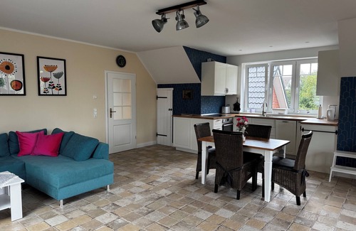 Nordholz Apartment | Loft apartment directly behind the dyke in the middle of nature with a large roof terrace