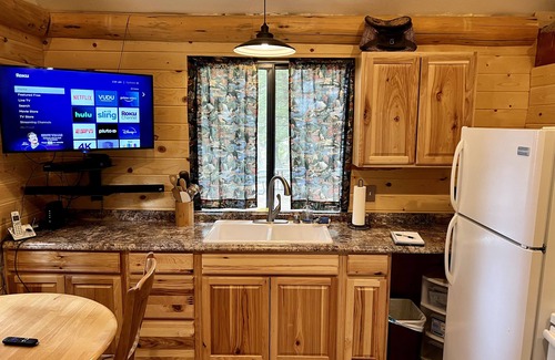 Island Park Cabin | Loft cabin nestled in the woods with two acres to yourself.