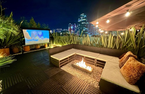 Santa Ana Apartment | Loft + private terrace with jacuzzi, fireplaces, cinema, panoramic view