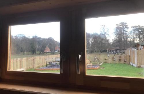 High Ercall Apartment | Log Cabin in Tiny Village