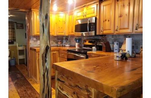 Saint Joe Cabin | Log cabin on 9 acres. Perfect for a winter retreat or summer trip to the river.