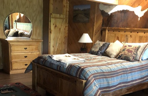 Bigfork Apartment | Log home studio in the woods. Pet friendly.