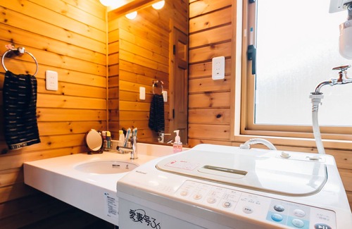 Toya House | Log-style house overlooking Lake Toya with parking lot / wifi