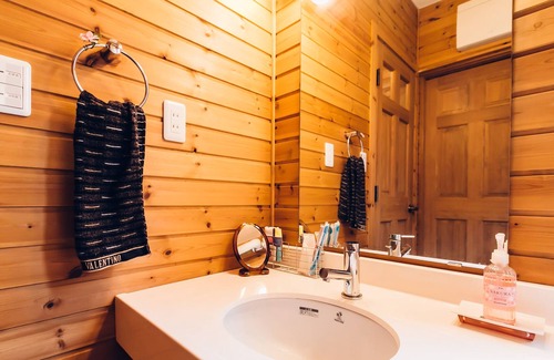Toya House | Log-style house overlooking Lake Toya with parking lot / wifi