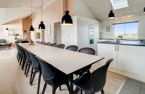 Klegod Strand House | Long drawn activity house with 18 m² swimming pool with slide, wifi and oven