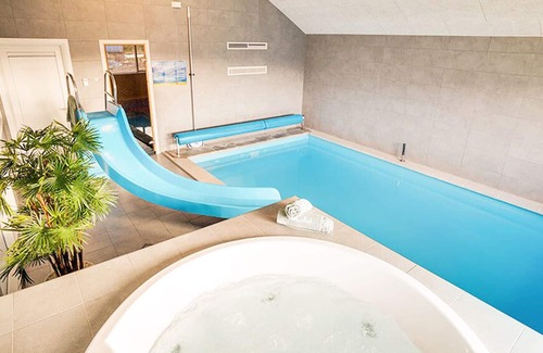 Klegod Strand House | Long drawn activity house with 18 m² swimming pool with slide, wifi and oven