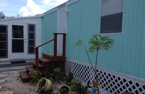 Key Largo Village House | Long term Rental/Ask for Disc! Updated Gem On Canal W/Bay Access & Attractions!