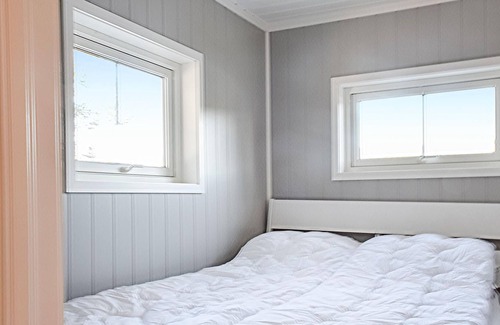 Evje House | Look forward to a dream vacation in the vacation home directly on the water.