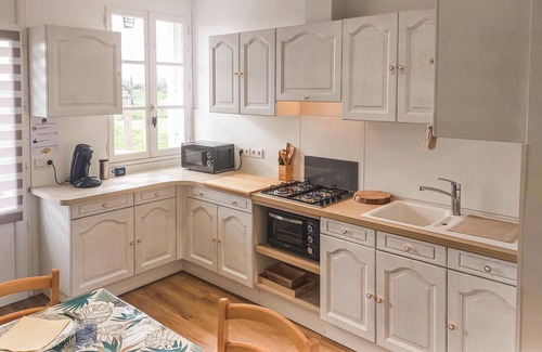 Hirel House | Look forward to spending your vacation in this vacation home near the beach.