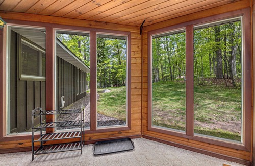 Lake Tomahawk House | Loon Landing | Quiet lakefront, sunroom, large yard, firepit, kayaks, Dogs OK
