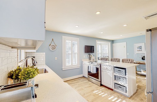 Cotuit House | Lovell's Pond Retreat - remodeled home with sunroom, steps to secluded pond