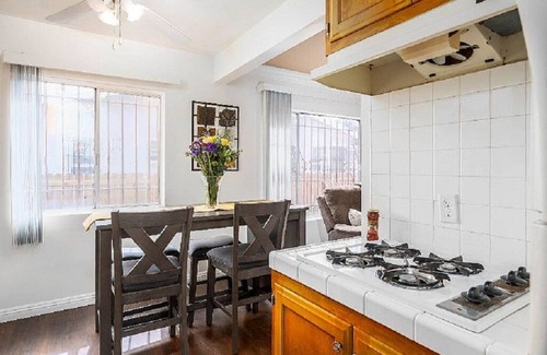 Inglewood Apartment | Lovely 2-bedroom lower unit 2, dual televisions, WiFi, gated building & parking