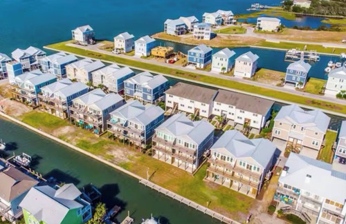 Topsail Beach House | Lovely 3-bedroom townhome on a canal for boating-kayaking- steps to the beach