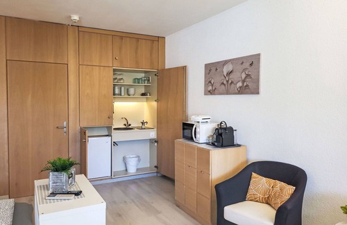 Bissone Apartment | Lovely apartment for 4 people with A/C, WIFI, pool, TV, balcony, panoramic view and parking