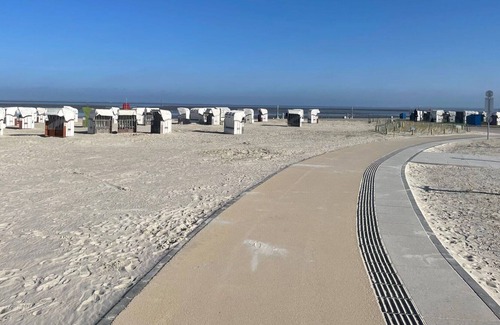 Norddeich Apartment | Lovely apartment for 4 guests with WIFI, TV, balcony, pets allowed and parking