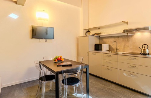 Dervio Apartment | Lovely apartment for 4 guests with A/C, WIFI, pool, TV, patio and panoramic view