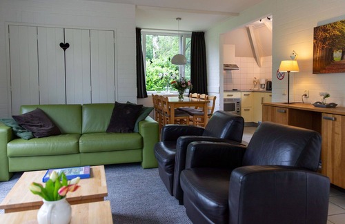 Municipality of Dalfsen House | Lovely apartment in villa for 4 guests with WIFI, pool, TV, terrace and parking