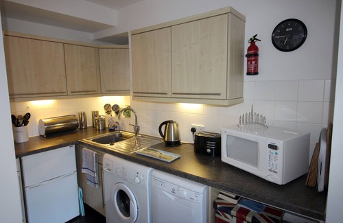 Brixham Apartment | Lovely apartment located directly on the Quay overlooking Brixham Harbour