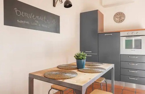 Ancona Condo | Lovely apartment with fireplace station area