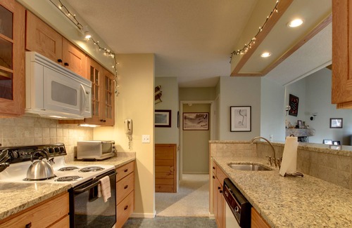 Warren Condo | Lovely Condo with Balcony, Ski Shuttle. Shared Hot Tub, Pools, Tennis, and Gym