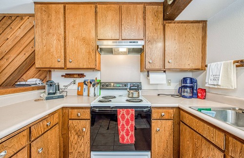 Lakeshore Condo | Lovely condo with free WiFi, pellet stove, large deck, & serene setting