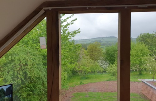 Ludwel Cottage | Lovely dog friendly cottage 4 miles from Ludlow with feature oak glass gable.