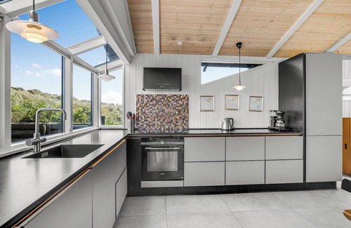 Houvig Strand Cottage | Lovely holiday home with outdoor spa and outdoor sauna located with a unique view in Houvig 1034