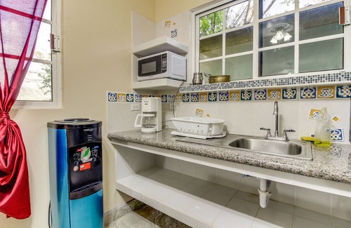 San Ignacio House | Lovely Home w/Balcony, Great View, Shared Pool, AC & WiFi - Ideal for Day Trips